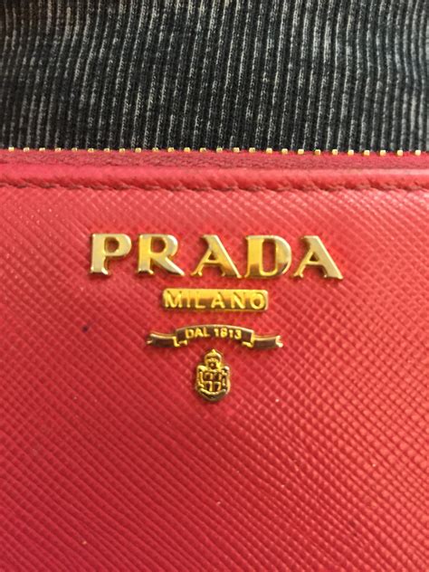 authentic vs fake prada wallet|prada wallet outlet.